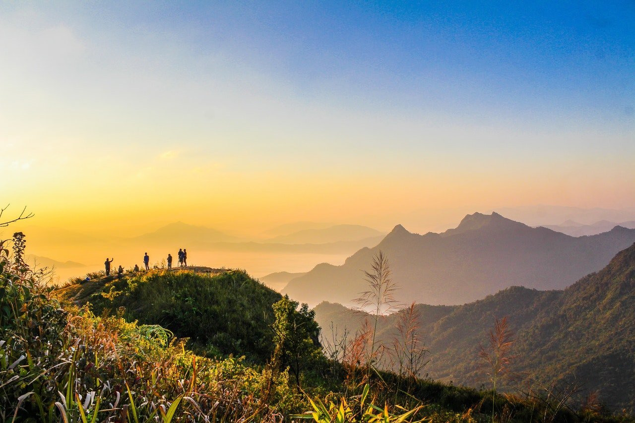 Services Photo Of People Standing On Top Of Mountain Near Grasses 733162